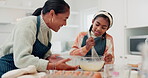 Cooking, food and mother and daughter in kitchen for cookies, happy or learning. Help, love and support with  woman and young girl baking in family home for dessert, recipe or breakfast together