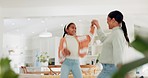 Mother, girl child and dancing in home with energy, crazy fun and happy freedom together. Excited mom, young kid and jump on couch for party celebration, play and love of dance music in living room