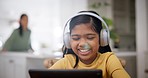 Computer, child and headphones with online education, music and learning at home. Web class, smile and young girl with audio and happy from student streaming a kids video for study in a house