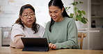Tablet, online and woman teaching senior frustrated by internet on retirement and learning communication device. Social media, discussion and elderly person and daughter use app in living room