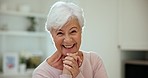 Happy, smile and face of senior woman at a home with sweet, cute and positive personality. Happiness, excited and portrait of elderly female person in retirement laughing at funny comic joke at house