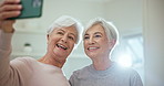 Senior friends, selfie and smile with a hug in home together with support, love and happy profile picture in retirement. Laughing, face and elderly women post on social media with  embrace in house