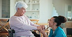 Support, conversation or nurse holding hands with old woman for medical help, senior care or patient empathy. Gratitude, retirement nursing home or elderly person with disability talking to caregiver