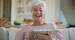 Laugh, tablet and senior woman on a sofa in living room watching a funny, comic or comedy video. Happy, smile and elderly female person scroll on social media or the internet with technology at home.