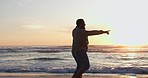 Beach silhouette, sunset and couple walking, point and gesture at outdoor view, destination or date location. Relax journey, sunshine and dark shadow of marriage people bonding on travel holiday