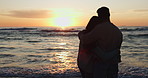 Beach sunset, silhouette or relax couple hug, bond and travel on nature vacation, anniversary date or island holiday. Summer freedom, sea waves or tropical people hugging with trust, support and love