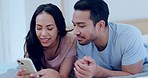 Relax, phone and young couple on the bed for bonding time together in modern apartment. Rest, conversation and people laying and scroll on social media, mobile app or internet with cellphone at home.