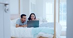 Couple, laptop and talking on bed for love, watch movies and relax for streaming multimedia. Happy woman, man and conversation in bedroom with computer, social media subscription and online shopping