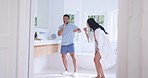 Brushing teeth, happy dancing and couple in bathroom with morning hygiene and toothbrush at home. Dental care, mirror and wellness with toothpaste and smile in a house with mouth cleaning with fun