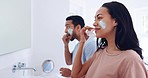 Skincare, cream and couple cleaning in bathroom, mirror and morning routine for facial wellness. Beauty, dermatology and cosmetics, man and woman with lotion in reflection for face treatment in home.