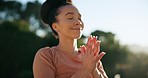 Happy woman, yoga and relax in nature for zen workout, exercise or outdoor meditation in the sun. Calm female person or yogi smile in namaste pose for spiritual wellness, mindfulness or awareness