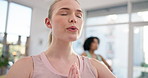 Meditation, yoga and breathing with woman in class for peace, fitness or spiritual health. Balance, mindfulness and wellness with person and relax in studio for holistic, zen and energy training