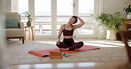 Woman, yoga and stretching in online class, fitness or zen workout on mat with tablet in living room at home. Calm female person or yogi in body warm up with technology for tutorial or pilates lesson