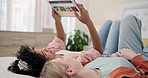 Tablet, search and women friends on a bed with ecommerce, choice or web catalog at home. Online shopping, sale and ladies in a bedroom for social media, browse or bond with subscription streaming