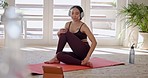 Happy woman, yoga and pilates in online class, fitness or zen workout on mat with headphones in living room at home. Female person or yogi in body warm up, stretching or tablet for tutorial or lesson