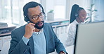 Computer, call center and a black man consultant working in customer service for support or assistance. Contact us, crm and headset communication with an employee consulting in a telemarketing office