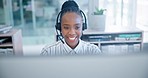 Black woman, call center and consulting in customer service, support or telemarketing at the office. African female person, consultant or agent talking with headphones in online advice at workplace