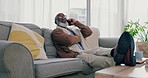 Relax, phone call and senior man on a sofa, smile and connection with conversation, talking and network. African person, home and pensioner with a cellphone, speaking or retirement in a living room