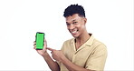 Man, pointing at phone screen and mockup, green screen and advertising with portrait isolated on white background. UX, website ads and marketing, technology branding with smartphone in a studio