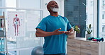 Fitness, yoga and breathing with a senior black man in a physiotherapy office for training or mental wellness. Exercise, workout and inhale with an elderly patient in a clinic for physical therapy