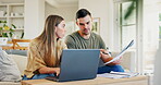 Talking, couple and laptop for a home budget, planning finance or a mortgage payment together. Future, sofa and a man and woman speaking with paperwork and computer for banking, investment or savings