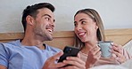 Happy couple, coffee cup and phone in bed, laugh or comic meme for post on web blog, morning or vacation. Man, woman and smartphone to watch funny movie, tea or reading notification on social network