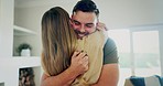 Real estate, keys and couple hug, happy or excited for new house, moving or mortgage success. Property, celebration and man with woman in dream home living room embrace for investment or relocation