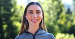 Fitness, woman and happy face outdoor with training, workout and exercise in a park. Portrait, female person and smile from running, wellness and sport in the forest with a athlete and runner