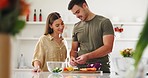 Vegetables, cooking and couple in the kitchen together for bonding with gourmet recipe. Happy, smile and young man and woman cutting ingredients for preparing a dinner, supper or lunch meal at home.