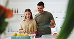 Tablet, food and a couple cooking a meal in their kitchen together for health, wellness or nutrition. Technology, health or diet with a man and woman in their house to prepare a supper from a recipe