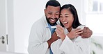 Wow, pregnancy test and excited couple hug in a bathroom in celebration of fertility success in their house. Pregnant, family planning and happy man with woman embrace while checking home testing kit