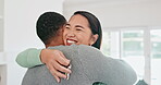 Happy couple, real estate and hug with keys to house, property or moving in together. Excited man and woman smile in embrace for relationship, investment or start in new home, goals or apartment