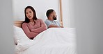 Couple in bed, fight with anger and frustrated, communication fail in marriage and risk of divorce. Stress, angry people in bedroom at home and life crisis, betrayal and broken trust in relationship