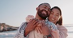 Couple, hug and love at beach outdoor with happiness, trust or summer vacation. A man and woman together for freedom, support or romance and embrace at ocean on holiday or travel adventure in nature