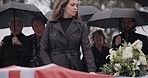 USA veteran funeral, woman and sad to touch casket, family and flag with mourning, depression and respect. Widow, people and army service with coffin, burial and crying for war hero in Philadelphia