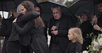 Funeral, crying family and people hug for grief support, mourning depression and death at emotional burial event. Kid child, mom and group together with widow hugging senior mother at coffin ceremony