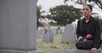 Sad woman, rose and graveyard in mourning, loss or grief at funeral, tombstone or cemetery. Female person with flower in depression, death or goodbye at memorial or burial service for loved one