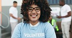 Happy, smile and face of woman volunteer working for community service, NGO or charity. Social, excited and headshot portrait of young female volunteering worker from Mexico at an outdoor event.