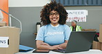 Woman, volunteering and laptop for online donation, community service and helping at NGO or nonprofit. Happy face of african person or volunteer on computer for charity and social media management