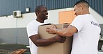 Happy man, volunteer and box in community service, partnership or teamwork in charity NGO together. Excited people, friends or volunteering workers with parcel boxes for distribution or contribution