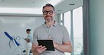 Face smile, tablet of man and chiropractor in clinic for telehealth, healthcare or rehabilitation. Portrait, technology and happy mature physiotherapist, medical professional and employee in glasses