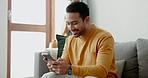 Hands, man texting and phone at home with social media post, networking and online on a sofa. Mobile app, happy message and typing on a living room couch with digital entertainment and tech in house