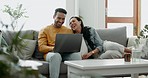 Couple, laptop and laugh on sofa in home for meme, watch movies and streaming funny multimedia. Happy man, woman and relax at computer in living room on social media, web subscription or comedy show