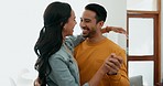 Dance, happy and a couple in a house for romance, love or support together. Funny, smile and a laughing man and woman with fun, honeymoon and bonding in a living room for a date, care or affection