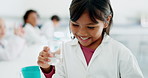 Girl, chemistry and child scientist, chemical in beaker with education, smile and knowledge, learning and study at school. Lab research, student with liquid for science and growth with development