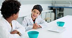 Education, science and children talking in class for a project, test or experiment together. Friends, chemistry and young boy kid students speaking with scientific products for a lesson in school lab