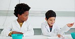 Learning, science and kids talking in class for project, test or experiment together in lab. Friends, chemistry and young boy children students speaking with scientific products for lesson in school.