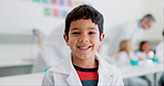 Boy, face and child scientist in class with education, smile and knowledge, learning and study at school. Lab research, student in science classroom and happy in portrait, growth and development