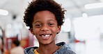 Face, education and an african boy student at a science fair for learning, growth or child development. Portrait, smile and future with a happy male kid at a school closeup for research or experiment