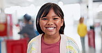 Face, children and a student girl at a science fair for learning, growth or child development. Portrait, smile and education with a happy young indian kid at school closeup for research or experiment